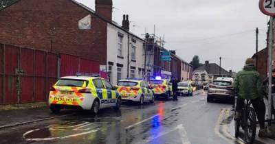 Firearms police scrambled to reports of gunman in Salford street as police swoop on neighbourhood - www.manchestereveningnews.co.uk - county Hamilton