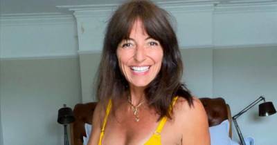 Davina McCall, 52, shows off incredible body and toned abs as she strips to bikinis - www.ok.co.uk