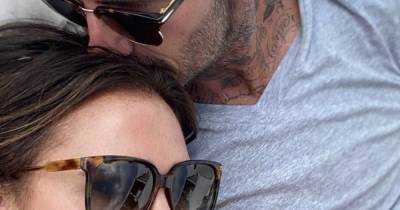 Victoria and David Beckham share rare loved-up snap as he plants loving kiss on his wife's head - www.ok.co.uk
