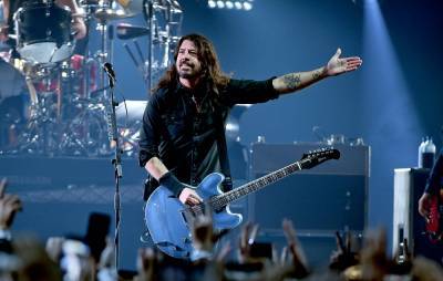 Watch Dave Grohl accept Nandi Bushell’s drum-off and set her new challenge - www.nme.com