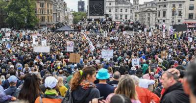 Anti-lockdown protesters gather in London calling coronavirus a 'hoax' - www.dailyrecord.co.uk - London - Berlin