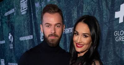 Nikki Bella welcomed her son one day before twin sister Brie Bella gave birth - www.wonderwall.com - county Love
