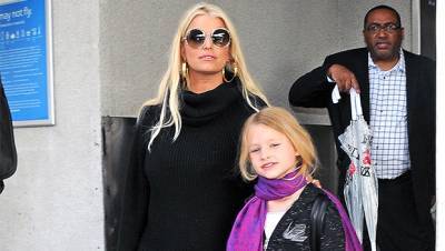 Jessica Simpson Cuddles Up To Daughter Maxi, 8, In The Pool More Of Their Look-Alike Pics - hollywoodlife.com