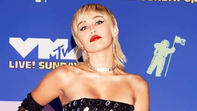 2020 MTV VMAs: Miley Cyrus dazzles in sparkling sheer dress, swings on disco ball during performance - www.foxnews.com