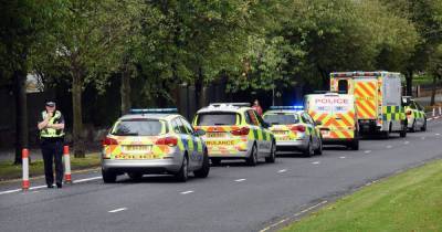 Police race to busy Glasgow street as man found seriously injured on road - www.dailyrecord.co.uk - Scotland
