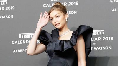 Gigi Hadid Models Her Bare Bump In Sheer Sheet While Being Hit With Beyonce Fan - hollywoodlife.com