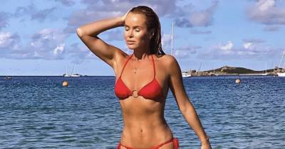 Amanda Holden raises temperatures as she poses in tiny red bikini at the beach - www.ok.co.uk