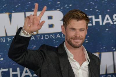 Chris Hemsworth going swimming with sharks for TV special - www.hollywood.com - Australia
