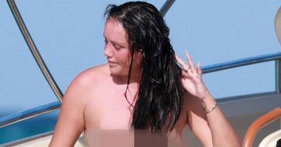 Charlotte Crosby sends temperatures soaring as she goes topless on boat during Ibiza holiday - www.ok.co.uk - Spain - county Crosby