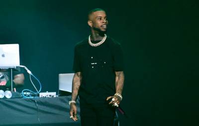Tory Lanez’ team deny he’s been deported after firearms arrest - www.nme.com - USA