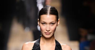 Bella Hadid criticizes NYPD officers for not wearing masks - www.wonderwall.com - New York