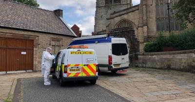 Forensics officers comb church gardens after murder probe launched - www.manchestereveningnews.co.uk - Manchester - city Wigan