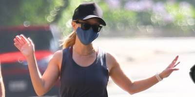 Reese Witherspoon Is in Good Spirits During a Jogging Session - www.justjared.com