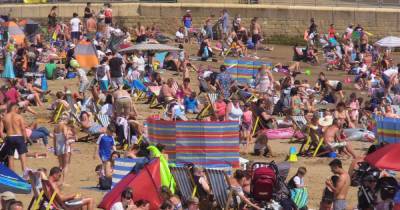 How long the warm weather will last as heatwave continues across the UK - www.manchestereveningnews.co.uk - Britain