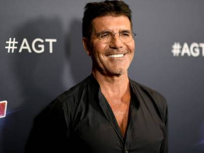 Simon Cowell hospitalized after breaking back during bike accident - canoe.com - California