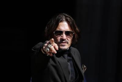 Johnny Depp Files for Defamation Case Delay to Film ‘Fantastic Beasts 3’ - variety.com - London - Washington - Virginia - county Heard