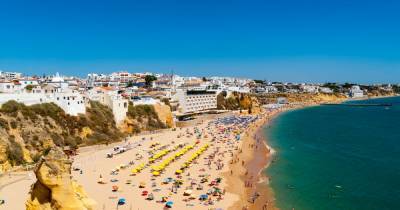 Latest travel advice for Portugal as holidaymakers scramble to get flights back to the UK - www.manchestereveningnews.co.uk - Britain - Portugal