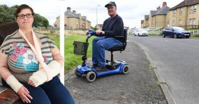 Disabled Blantyre couple hit out at state of pavements after fall causes double-wrist break - www.dailyrecord.co.uk