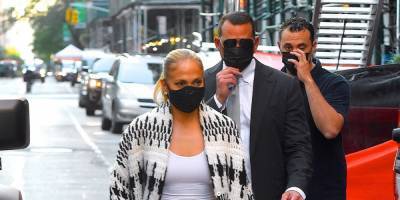J.Lo Proves She's Ready for Fall in a Chunky Knit Cardigan and Crystal-Covered Face Mask - www.harpersbazaar.com - Manhattan