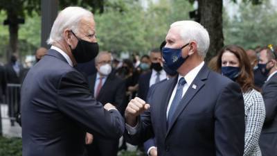 Joe Biden and Vice President Mike Pence Greet Each Other at 9/11 Ceremony -- See More Celebrity Tributes - www.etonline.com - New York