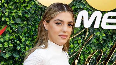 Sylvester Stallone’s Daughter Sistine, 22, Stuns In White Mini Dress While Showing Dad Her Golf Skills - hollywoodlife.com