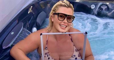 Gemma Collins flaunts her incredible figure in a leopard print swimsuit as she holds £10,000 cash in hot tub - www.ok.co.uk - Manchester