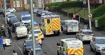 Teens rushed to hospital after 'mass brawl involving eight thugs' with weapons in Glasgow street - www.dailyrecord.co.uk