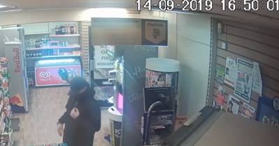 Police launch CCTV appeal after thug threatens Scots shop staff during raid - www.dailyrecord.co.uk - Scotland