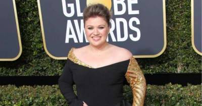 Kelly Clarkson is staying positive amid divorce: 'I feel pretty good and happy' - www.msn.com