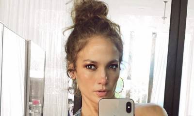 Jennifer Lopez showcases her bikini body and washboard abs in incredible swimsuit selfie - hellomagazine.com