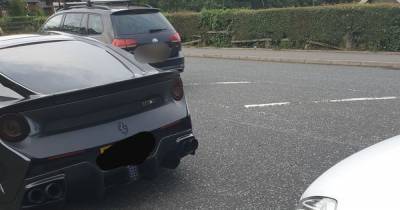 Ferrari driver fined by police after being spotted 'causing concern' in Bury - www.manchestereveningnews.co.uk