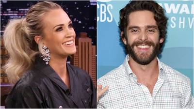 Carrie Underwood and Thomas Rhett React to Historic ACM Entertainer of the Year Award Tie (Exclusive) - www.etonline.com