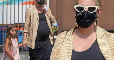 Ashlee Simpson shows off baby bump in black maxi dress in LA - www.msn.com - state Connecticut