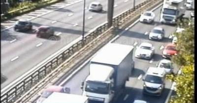 Motorcyclist in hospital with serious injuries after collision with stationary car on the M60 - www.manchestereveningnews.co.uk