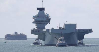 Around 100 sailors aboard Royal Navy aircraft carrier self-isolating after crew test positive for coronavirus - www.dailyrecord.co.uk - city Portsmouth