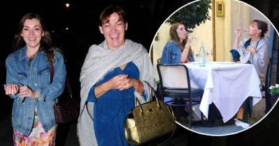 Lorraine Kelly knocks back wine with her daughter Rosie during dinner - www.msn.com