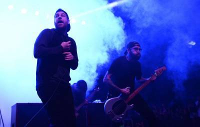 The Ghost Inside say they made “wrong call” in firing bassist over racial slur - www.nme.com