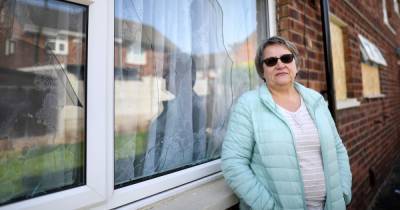 'I cannot stop myself shaking and crying': Nightmare neighbour jailed after terrorising woman, 62, for months and smashing her windows - www.manchestereveningnews.co.uk - Manchester