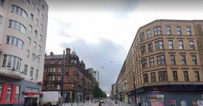 Cops and paramedics race to Glasgow street amid reports of man falling from scaffolding - www.dailyrecord.co.uk - Scotland