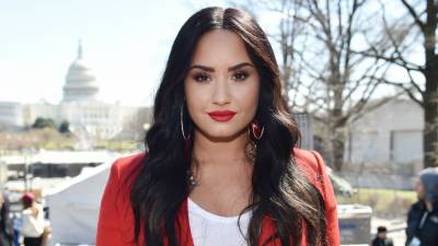 Demi Lovato Shines a Light on Her Newfound Activism and 'Year of Growth' - www.etonline.com