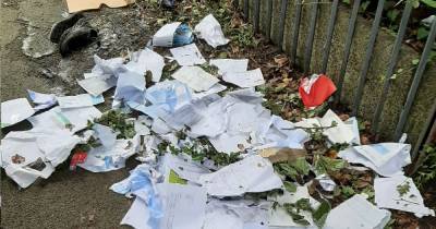 Residents say knife and discarded bullets were found in fly-tipped waste dumped in alleyway - www.manchestereveningnews.co.uk - Manchester