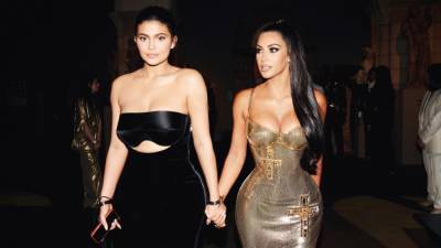 Kim Kardashian Gives Birth to Kylie Jenner in Kanye West and Tyga's Leaked Music Video - www.etonline.com