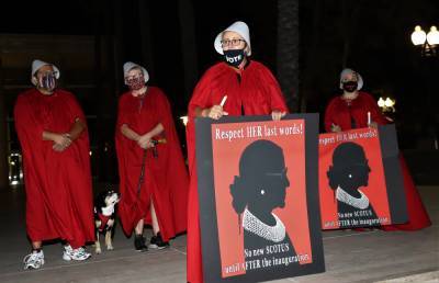 Women Wear ‘Handmaid’s Tale’ Costumes At Ruth Bader Ginsburg Vigil To Protest Trump And McConnell’s Actions - deadline.com