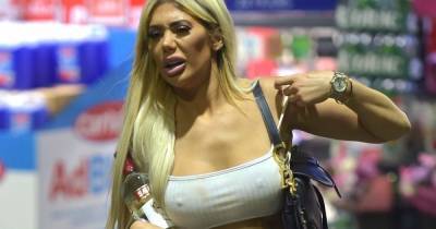 Chloe Ferry looks worse for wear as she forgets bra and carries bottle of vodka on wild night out - www.ok.co.uk - city Newcastle