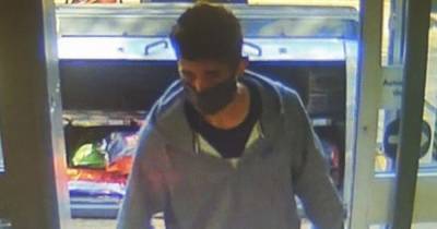 A knifeman ordered a terrified Co-op worker to let him leave the store with a basket of shopping - police want to speak to this man - www.manchestereveningnews.co.uk