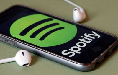Spotify UK to launch music and news podcasts in personalised playlist - www.nme.com - Britain - USA