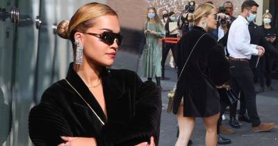 Rita Ora arrives for Fendi's MFW show in a velvet blazer and fishnets - www.msn.com
