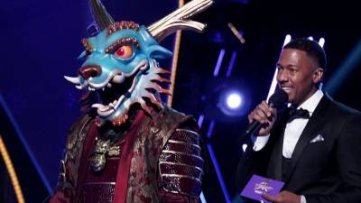 'The Masked Singer': The Dragon Gets Slayed In First Elimination of Season 4! - www.etonline.com