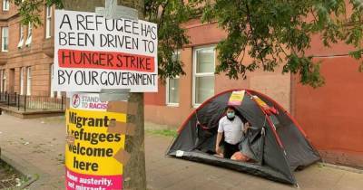 Asylum seeker who sewed mouth shut in hunger strike outside Glasgow Home Office granted temporary leave to remain - www.dailyrecord.co.uk - Britain