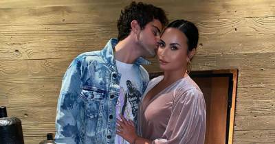 Demi Lovato Wears ‘Dogs Over People’ Shirt and Ditches Ring After Max Ehrich Split - www.usmagazine.com